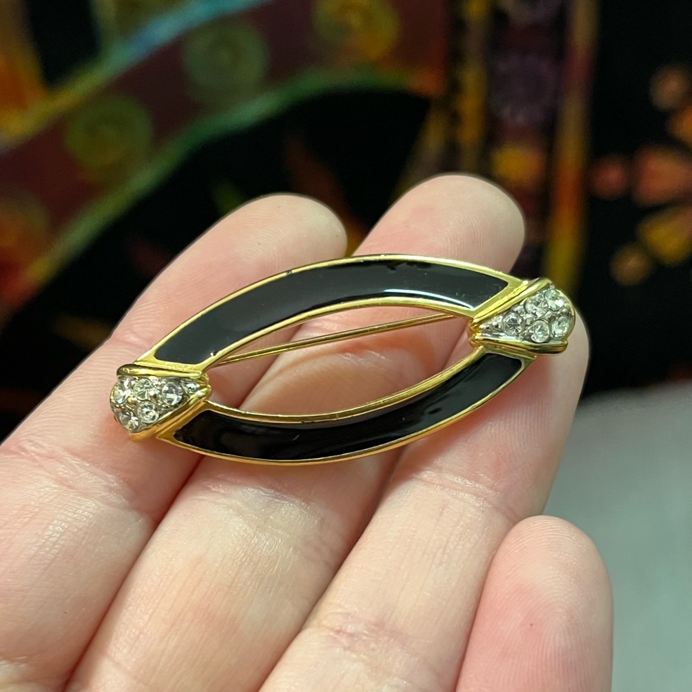Trifari Black and Gold Enamel Marquise Brooch with Rhinestones